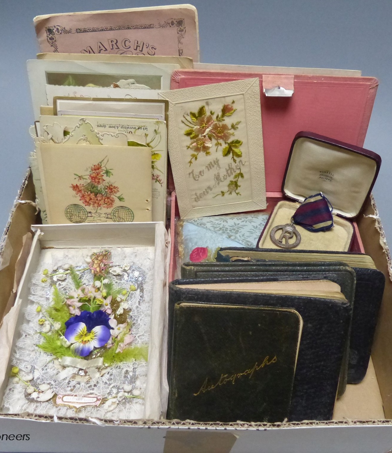 A collection of early 20th century greetings cards, Valentine's cards, autograph albums etc